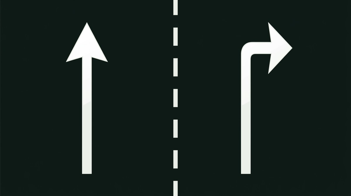 White straight-ahead and right-turn pavement arrows in two lanes with a dashed lane line between them