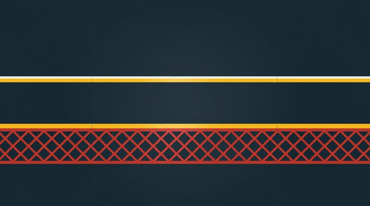 Forklift corridor marked with yellow lines and a red cross-hatched exclusion strip