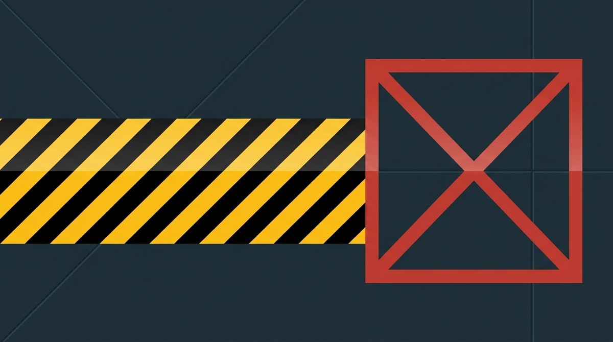 Black and yellow hazard striping beside a red keep-clear cross box
