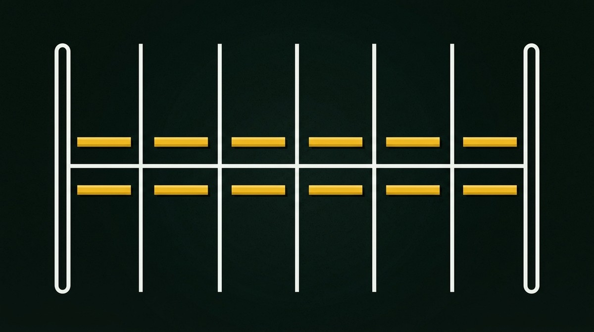 Parking bays with yellow wheel stops marked square at the head of each bay